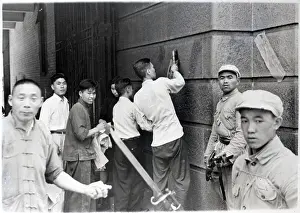 Chinese Communists Hang Up Signs