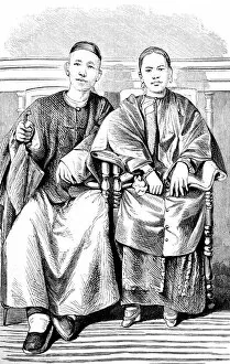 Images Dated 6th August 2017: Chinese couple portrait sitting in chair, full length