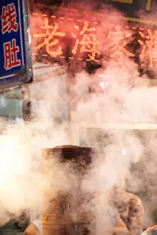 Chinese dumpling steamer in Xian street at night