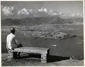 Chinese Man Sits On Bench In Hong Kong