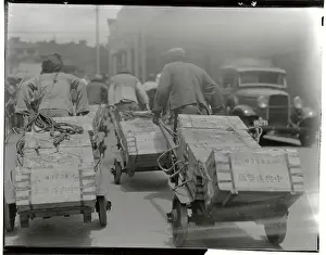 Laboring Prints: Chinese Men Pulling Heavy Loads of Silver Bullion