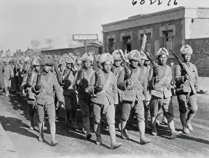 Chinese Soldiers Marching with Weapons