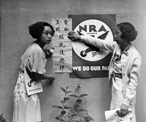 Posting Prints: Chinese Women Posting NRA Signs