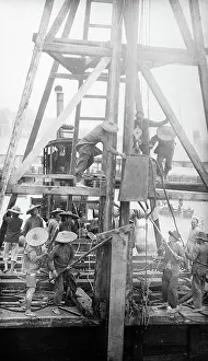 Pile Prints: Chinese Workers Using Small Engine