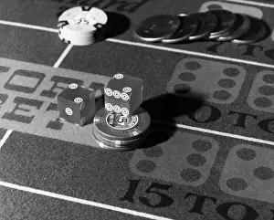 Casino Prints: Chips and Dice on Craps Table