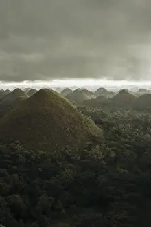 Chocolate hills landscape from Bohol Island, a big storm covers the sky making an interesting lighting effect