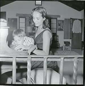 Christian Brando with His Mother at Piano