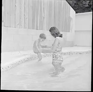 Christian Brando with His Mother in Pool