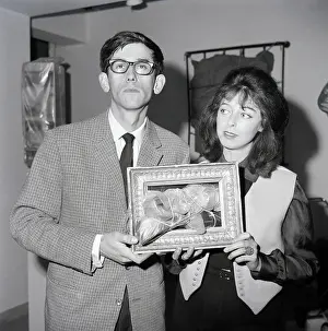 Picture Frame Prints: Christo and Jeanne-Claude Holding Artwork