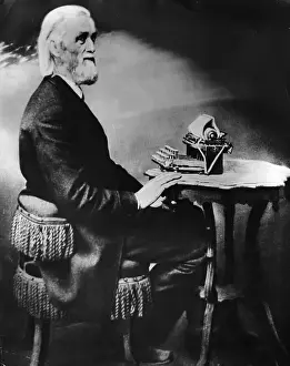 Inventor Prints: Christopher Latham Sholes Sitting at Typewriter