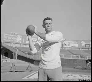 Chuck Conerly Holding Football in Throwing Position