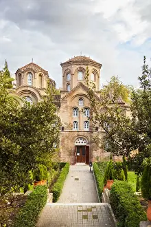 Greek Orthodox Prints: A church building with door open and gardens