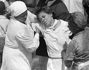 Intensity Prints: Two Church Disciples Help a Newly Baptised Woman Ashore