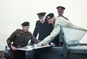 Churchill and Generals Studying Maps