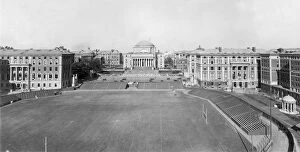 Images Dated 5th April 2016: circa 1915: View of the campus of Columbia University, with the football field in the foreground