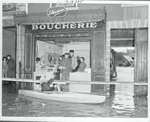 Citizen Purchasing Food From Boat During Flood