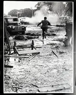Revolt Prints: Civilian Runs for Safety from Bombs