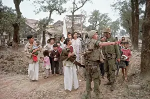 Vietcong Prints: Civilians with Marines During Battle of Hue
