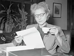 Clair Boothe Luce Reading a Letter