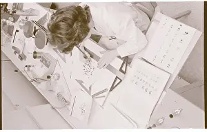 Claire Hacker Examining Chromosome Patterns