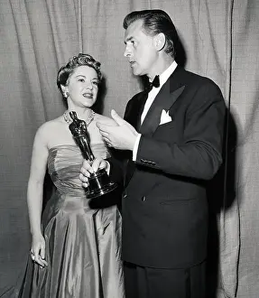 Statuette Prints: Claire Trevor Presents Academy Award to Stewart Granger