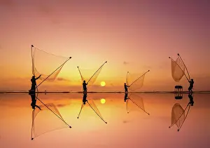Shore Prints: Clam harvesting - fisherman at sunrise - Go cong, Tan Thanh Beach, Vietnam