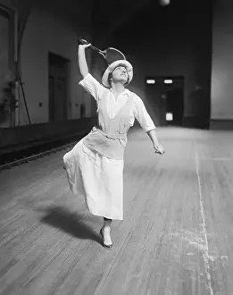 Swinging Prints: Clare Cassel Playing in Women's National Indoor Tennis Championship