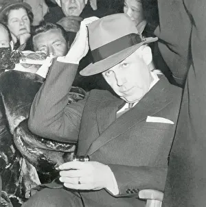 Exhausted Prints: Clarence Campbell Adjusting His Hat