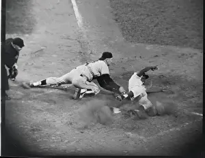 Clarence Coleman Sliding into Home