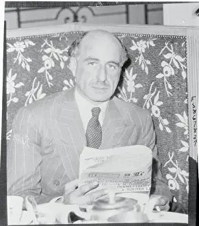 Clarence Hatry Reading a Magazine