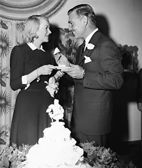 Clark Gable Feeding Cake to his Bride