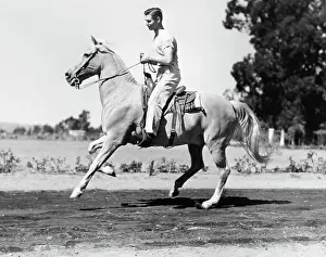 Clark Gable Riding a Horse