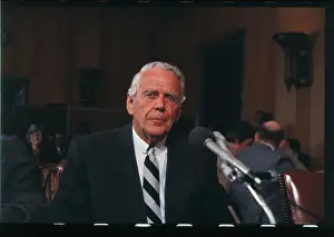 Clark Gifford Speaking into Microphones