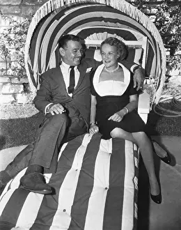 Clark and Kay Gable Posing on Lounger