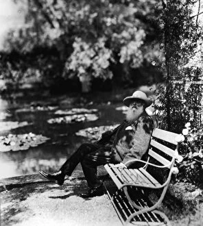 Famous Artists Gallery: Claude Monet Sitting On Park Bench