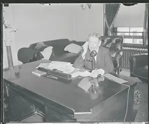 Claude Swanson Talking on Telephone