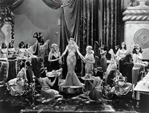 Claudette Colbert as Cleopatra