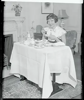 Claudette Colbert Enjoying Her Breakfast