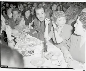 Claudette Colbert with Friends at Ball
