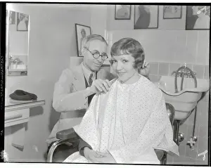 Claudette Colbert Getting Haircut