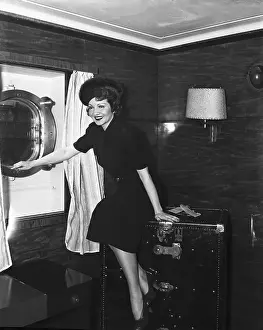 Traveling Prints: Claudette Colbert in Ship Cabin