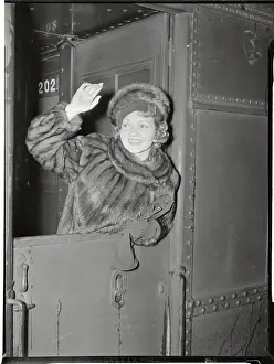 Claudette Colbert Waving From Train