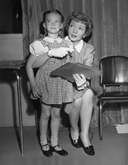Prints of 1946: French-born actor Claudette Colbert (1903 - 1996) (right) Grace, Glamour & Timeless Elegance: Claudette And Natalie
