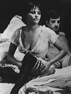 Claudia Cardinale and Jean-Paul Belmondo in Intimate Scene
