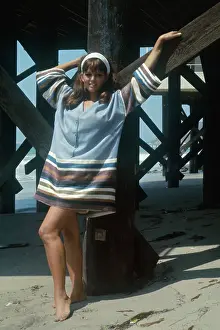 Malibu Prints: Claudia Cardinale Standing by Boardwalk