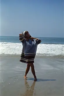 Malibu Prints: Claudia Cardinale Walking on Beach Shoreline