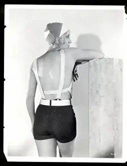 Modeling Prints: Claudia Dell Models Back Of Bathing Suit