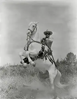 Rearing Prints: Clayton Moore as The Lone Ranger astride Silver