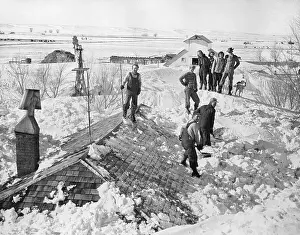 Digging Prints: Cleaning Snow off of Buried House