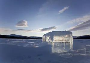 Yukon Territory Prints: Clear ice cube on frozen Fish Lake, cut out with a chain saw, Yukon Territory, Canada